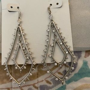 Kendra Scott silver and crystal earrings.